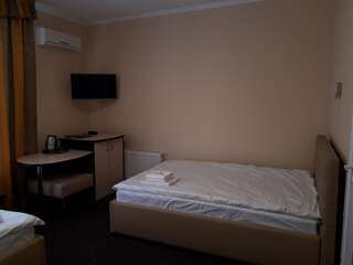 Отель Орхідея Romny Улучшенный двухместный номер с 2 двуспальными кроватями-6