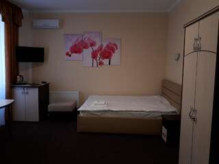 Отель Орхідея Romny Улучшенный двухместный номер с 2 двуспальными кроватями-7